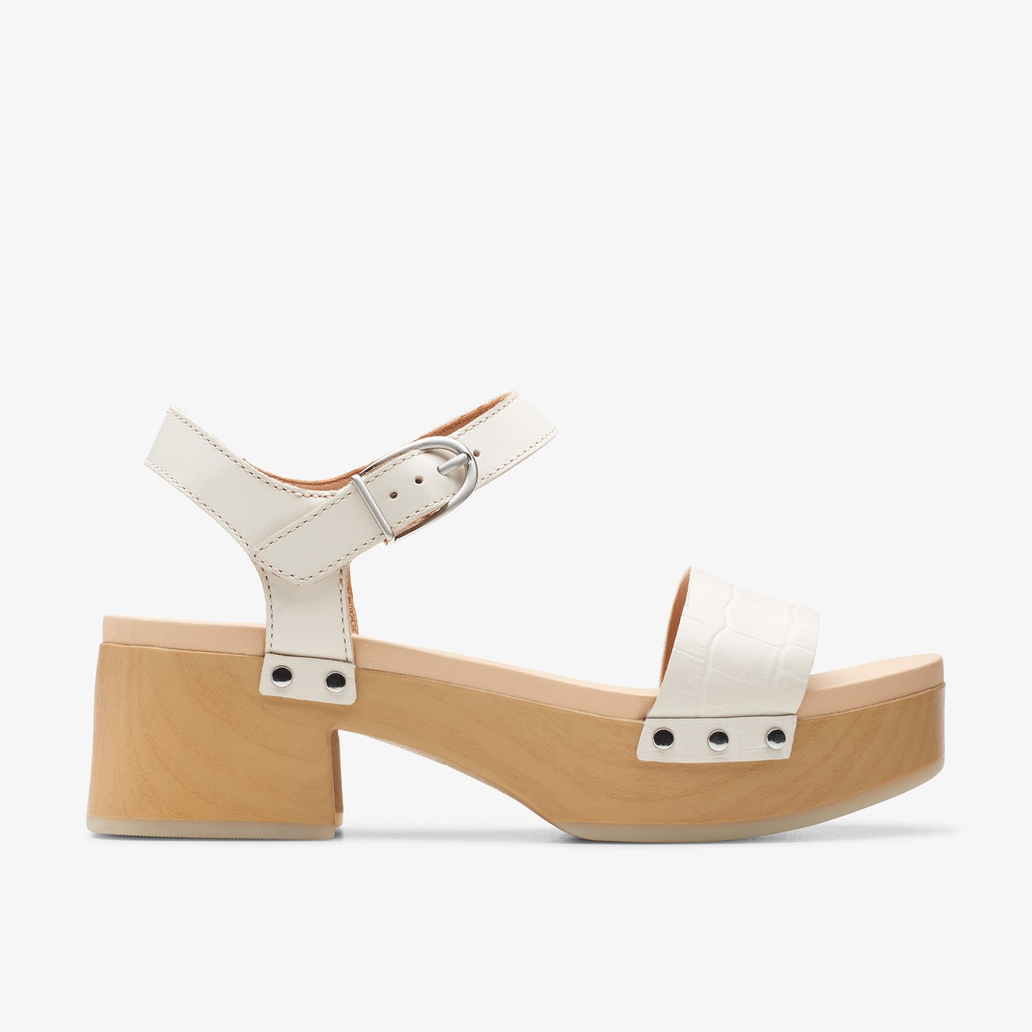 White leather heeled sandal with ankle strap and silver buckle.