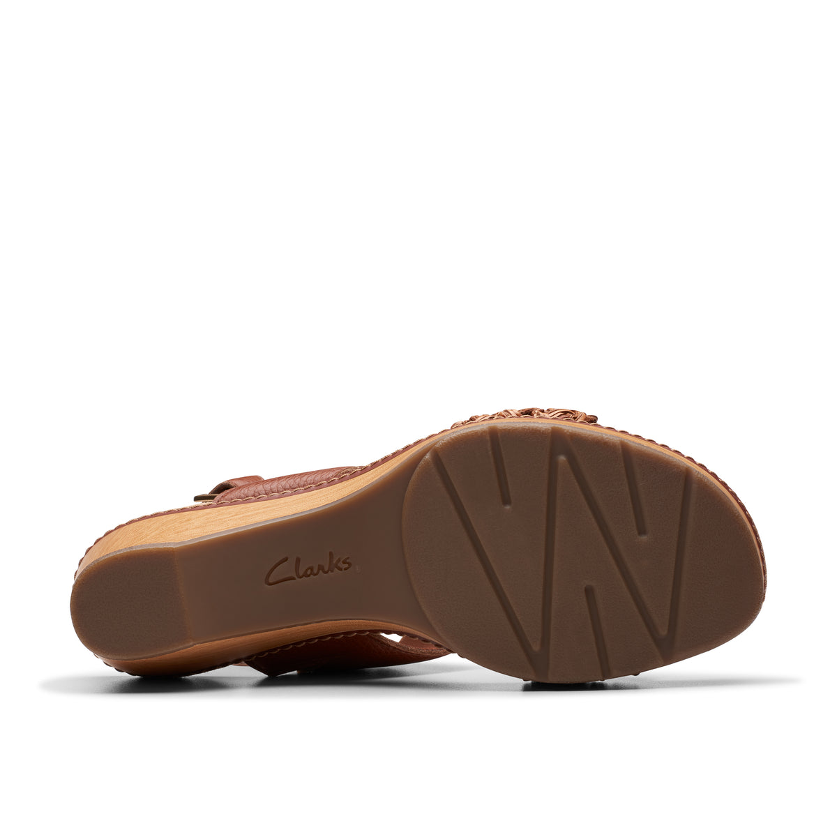 Bottom view of brown woven wedge sandal with textured sole and "Clarks" written on the insole.