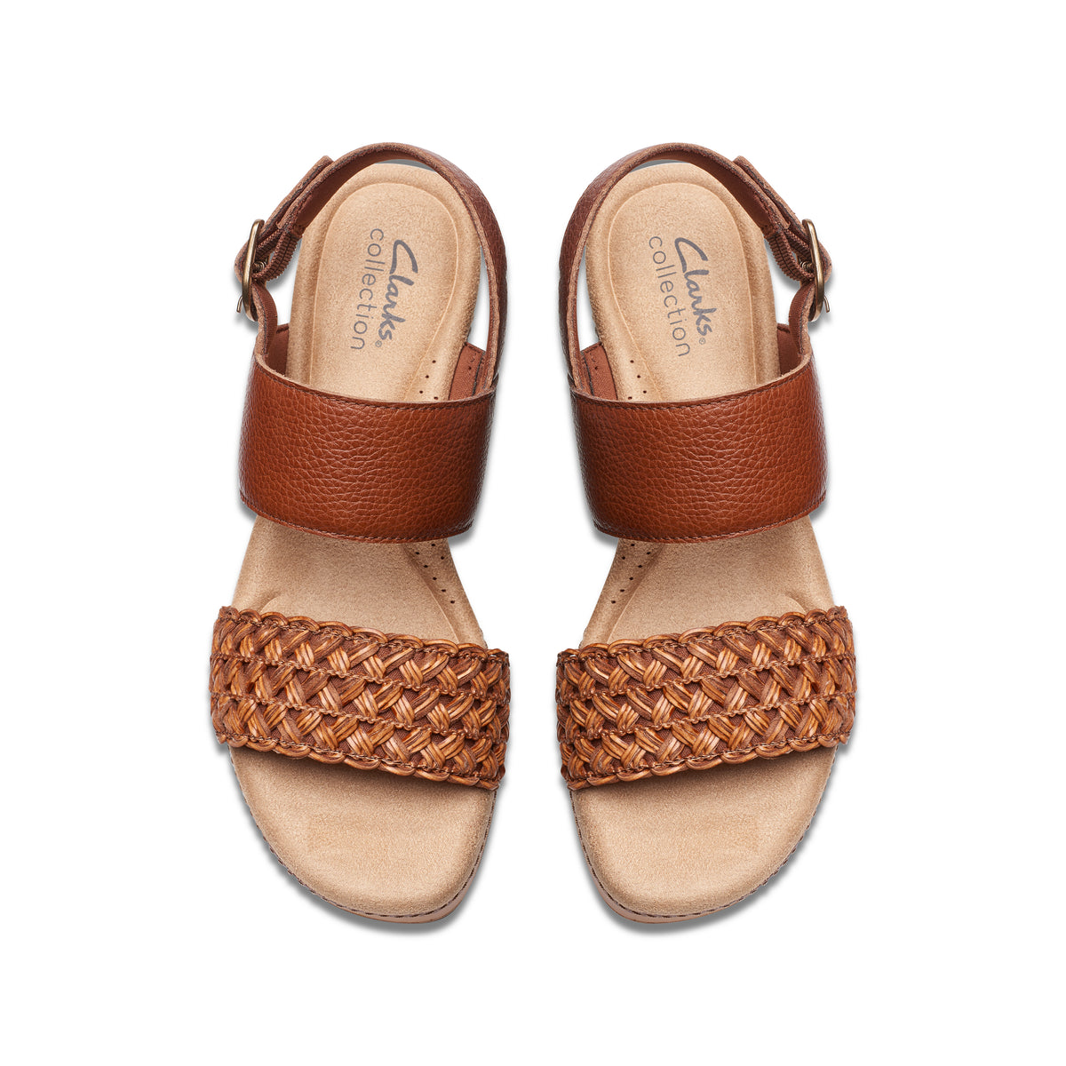 Pair of brown strappy sandals with a woven toe strap and ankle buckle