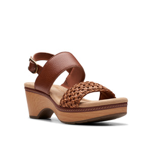 Brown leather platform sandal with a woven instep strap and an ankle strap.