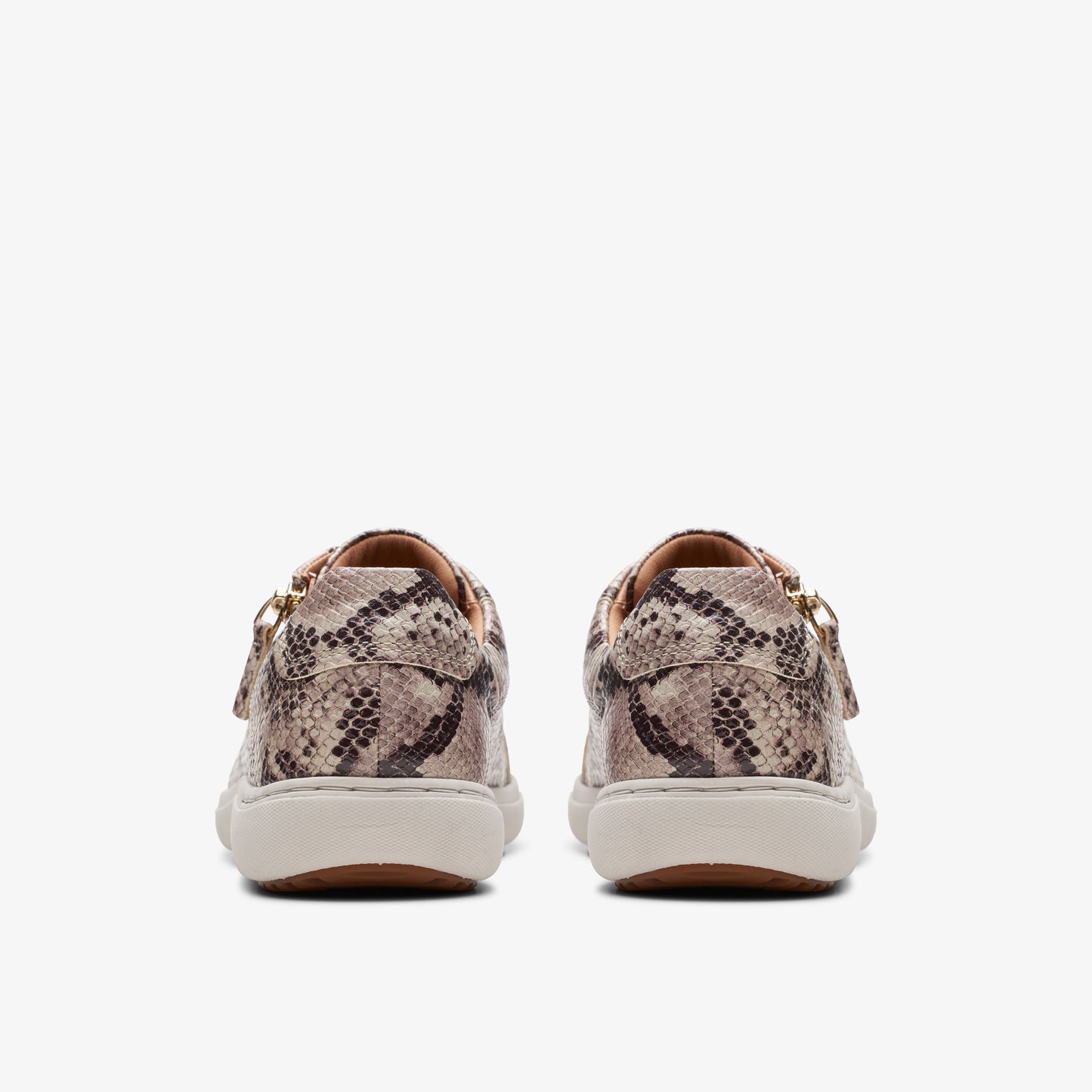 Rear view of low-top sneakers with a snakeskin pattern.