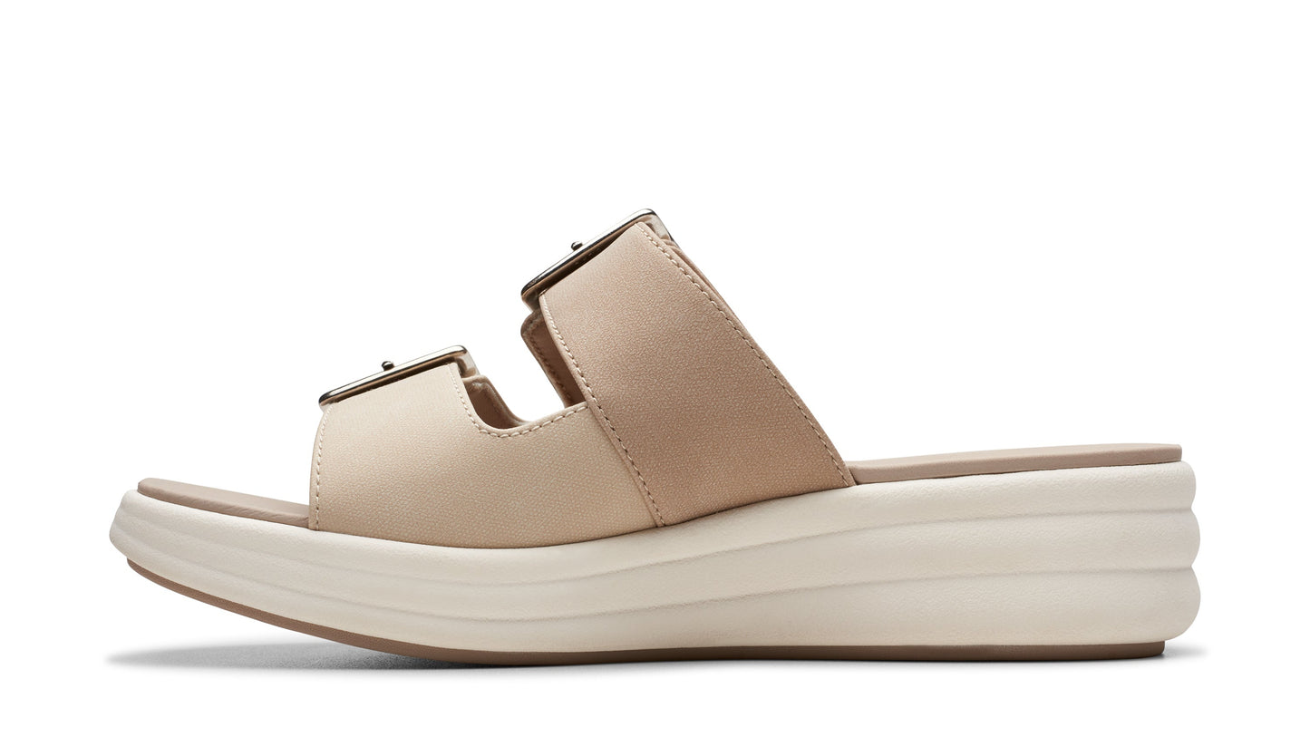 Beige slide sandal with two buckled straps and thick platform sole.