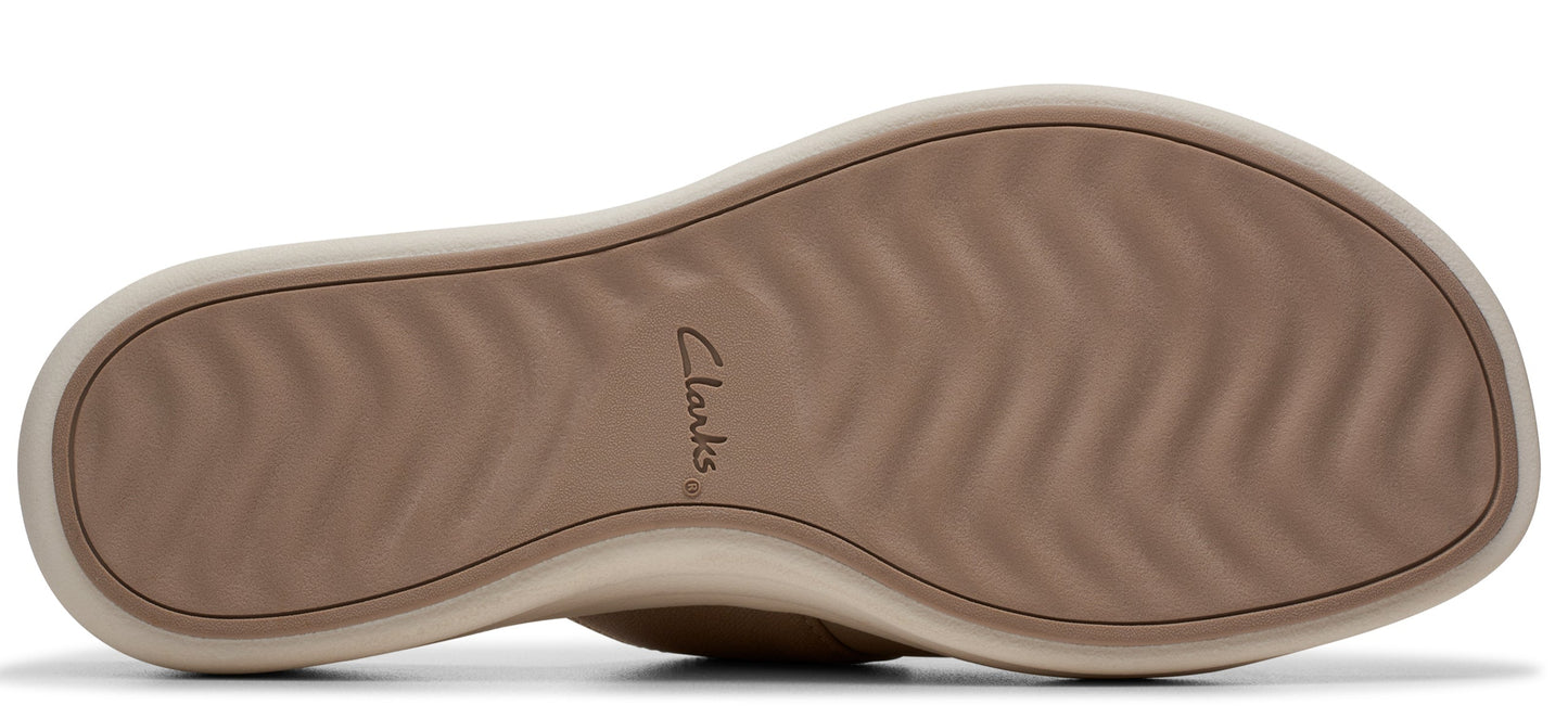 The sole of a shoe with "Clarks" written on the side.