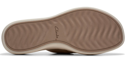 The sole of a shoe with "Clarks" written on the side.