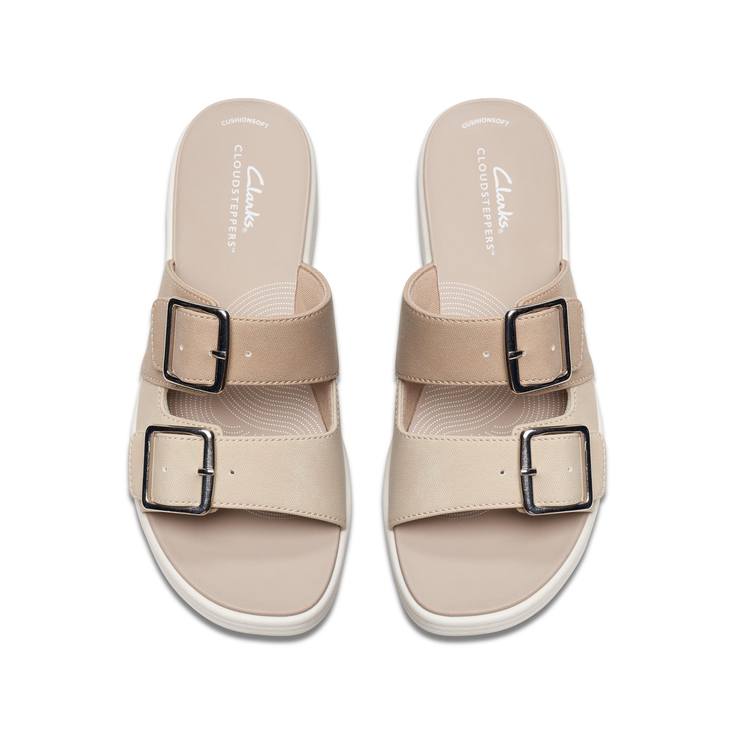 Pair of CLOUDSTEPPERS sandals in a neutral tan color with silver hardware.