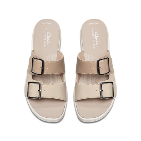 Pair of CLOUDSTEPPERS sandals in a neutral tan color with silver hardware.