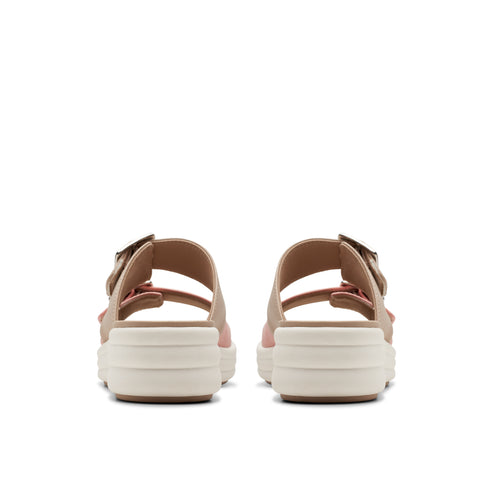 Pair of platform sandals with adjustable straps and buckle closures, viewed from behind.