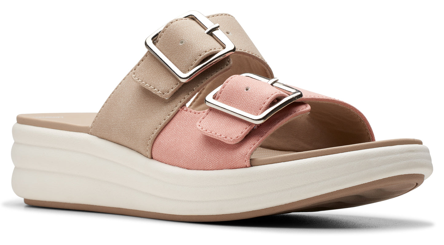 Slip-on sandal featuring two adjustable buckle straps, a beige upper strap, a light-pink lower strap, and a white platform sole.