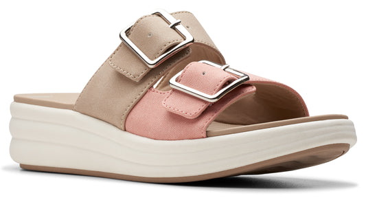 Slip-on sandal featuring two adjustable buckle straps, a beige upper strap, a light-pink lower strap, and a white platform sole.