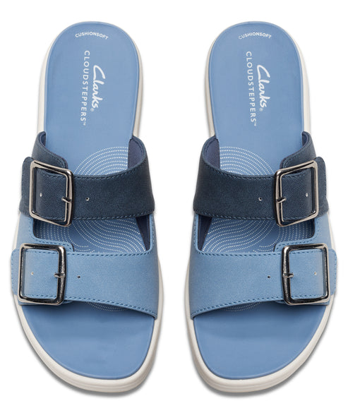 Two light-blue sandals with two straps each, each strap has a rectangular metallic buckle; the top strap is dark blue with CLOUDSTEPPERS text on the inside of the sandal.