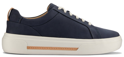 A low-top dark blue sneaker with white laces and a thick white sole.