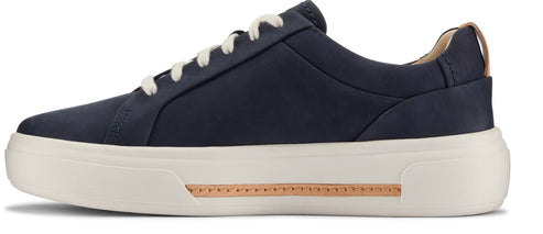 A low-top navy blue sneaker with white laces and a thick white sole.