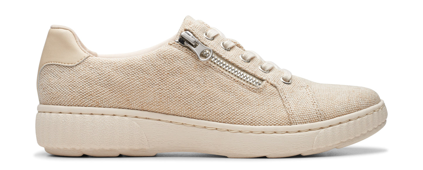 Beige low-top sneaker with side zipper.