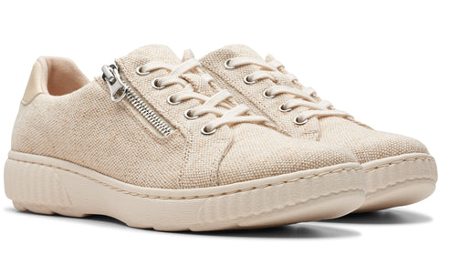 Beige canvas sneakers with laces and side zipper.