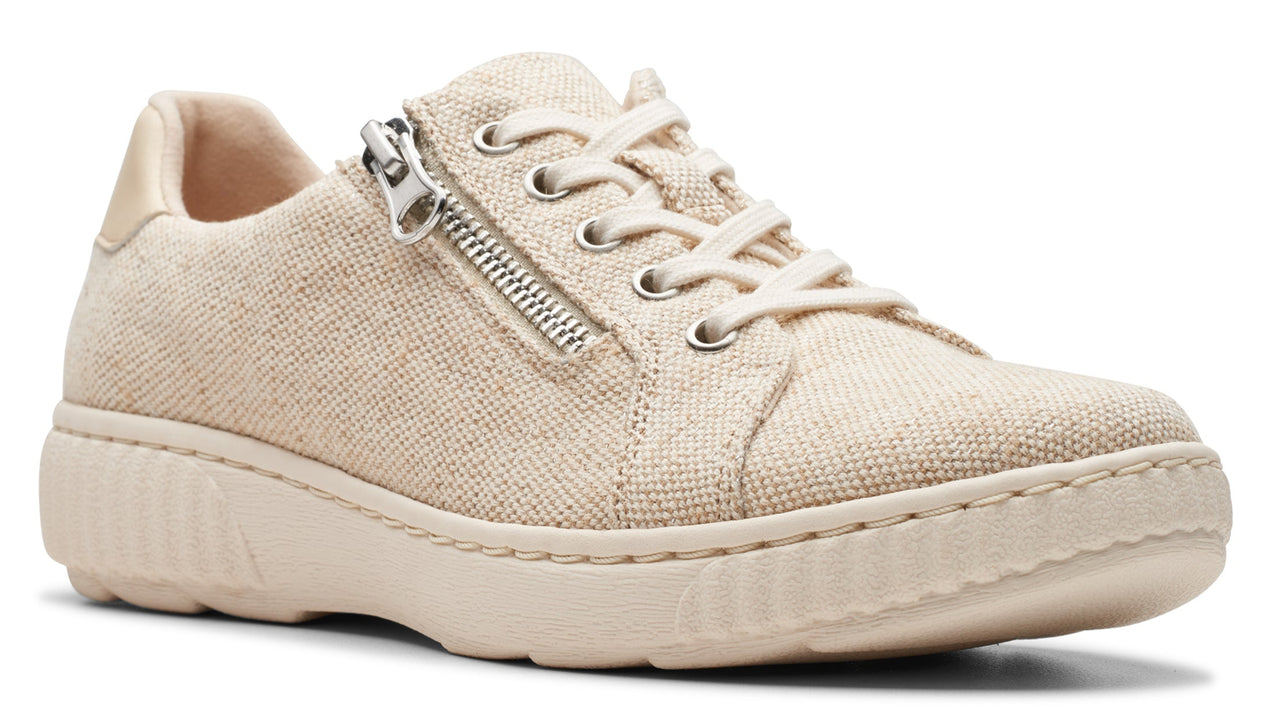 Beige canvas sneaker with side zipper and off-white sole.