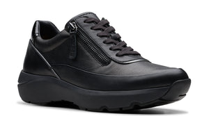 Black leather walking shoe with side zipper and low platform sole.