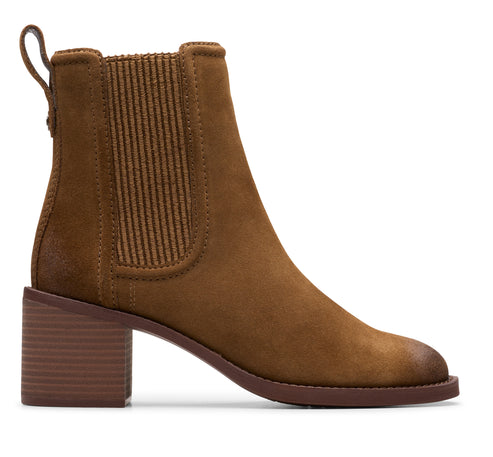 Brown suede ankle boot with block heel and pull tab.