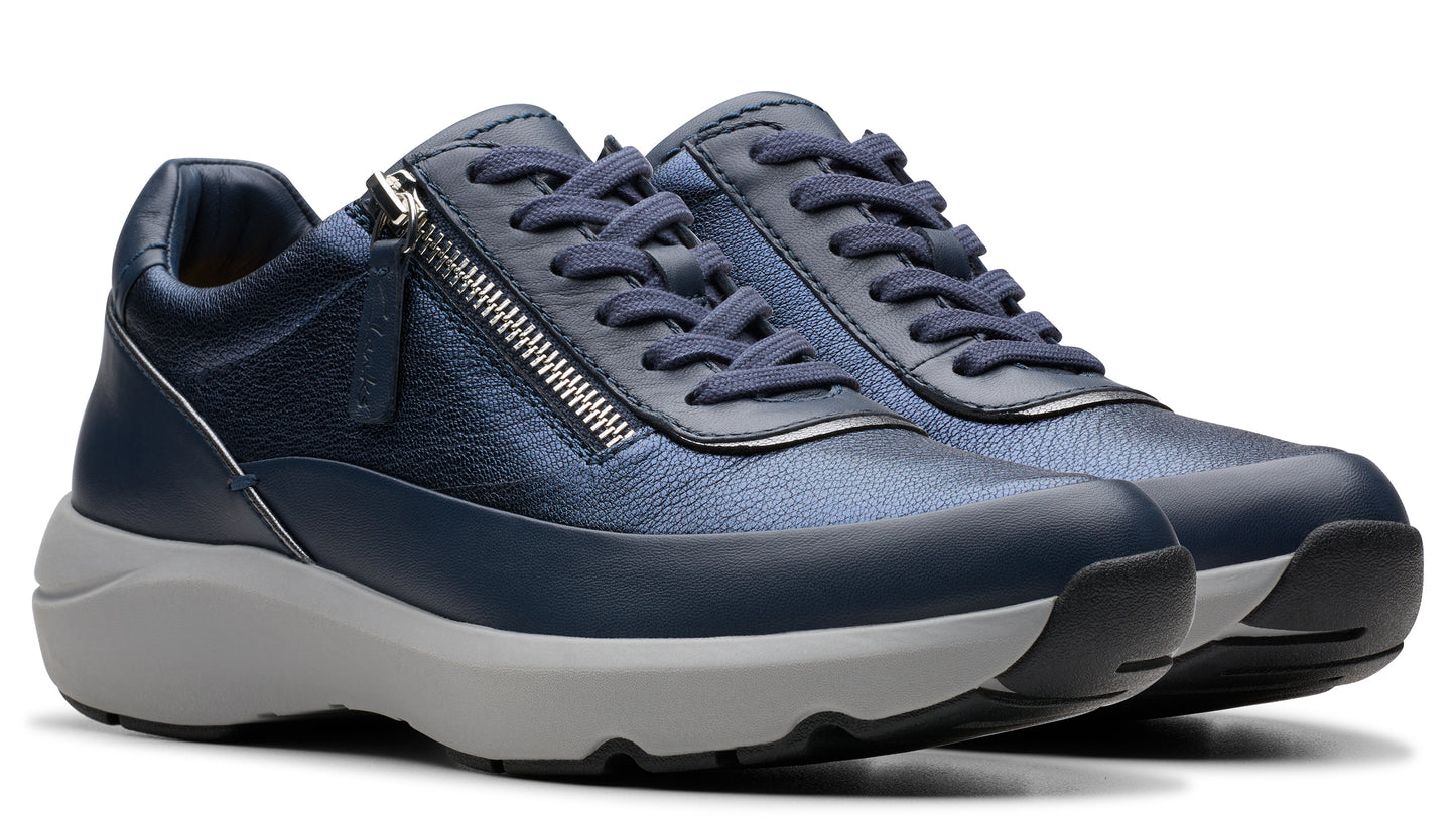 Blue leather sneakers with laces and a side zipper, featuring a gray and black sole.