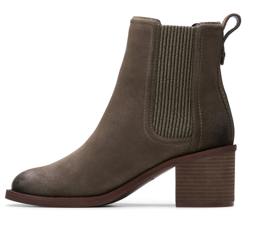 Side view of a women's ankle boot with a block heel and elastic goring.