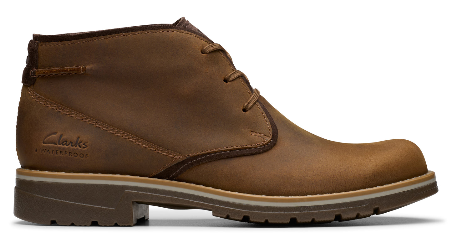 Leather ankle boot with thin laces, and textured sole, showing 'Clarks' logo.