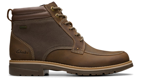 Brown leather ankle boot with laces and visible stitching details.