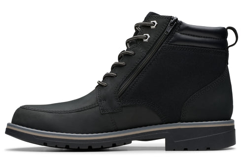 Black ankle-high boot with laces and side zipper.