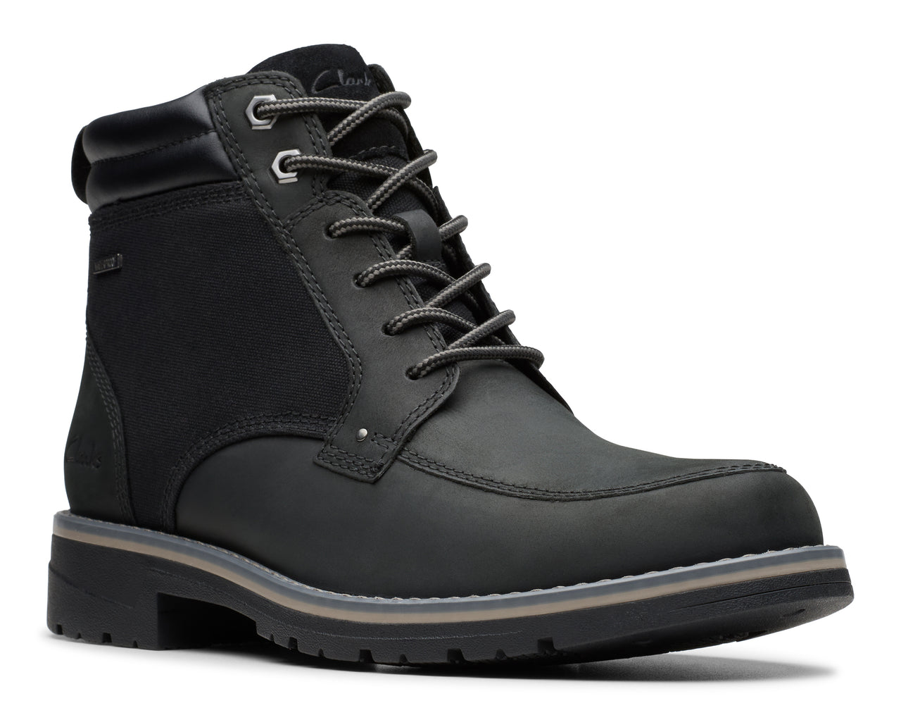 Black ankle boot with lace-up closure, metal eyelets, and textured sole.