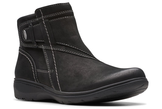Black ankle boot with white stitching detail and side buckle.