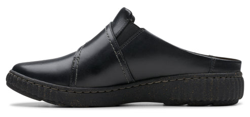Black leather clog with a criss-cross strap.