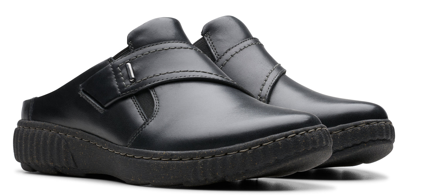 Pair of black leather clogs with strap.