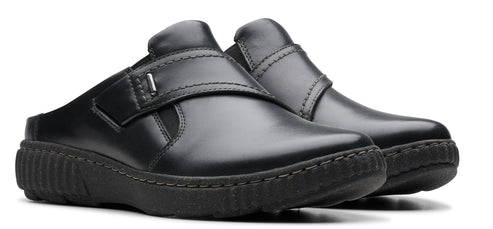 Pair of black leather clogs with strap.