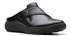 Black leather clog with an adjustable strap