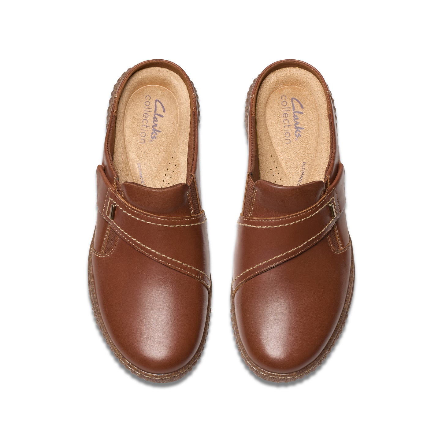 Pair of brown leather clogs with criss-cross straps and "Clarks Collection" printed on the insole.