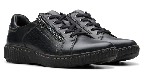 Pair of black leather sneakers with black laces and a side zipper on one side.