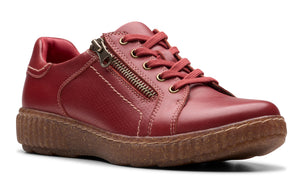 Red leather sneaker with laces and a zipper on the side.