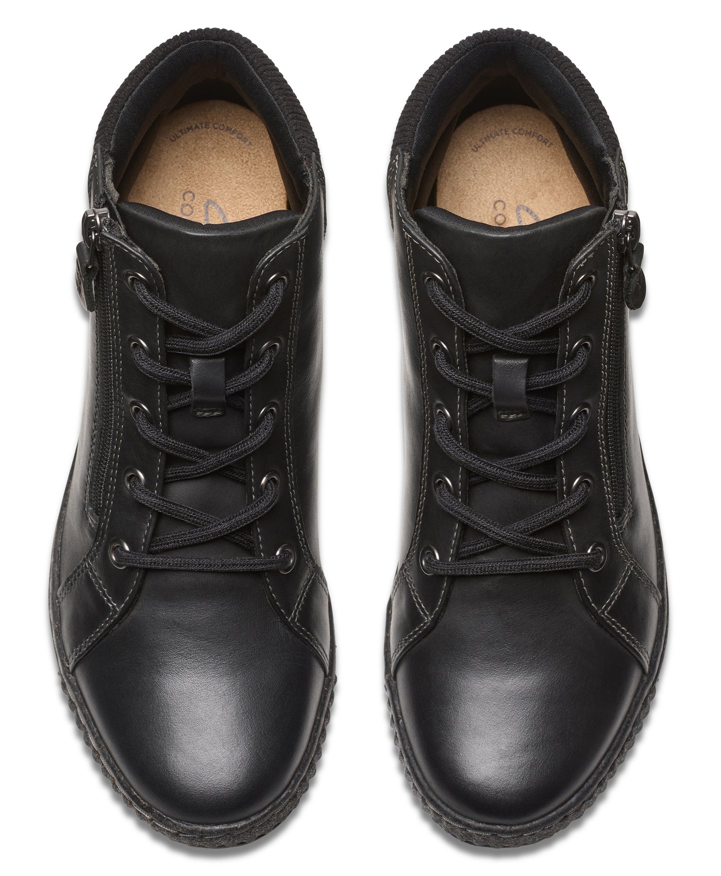 Top-down view of black leather ankle boots with zipper and lace-up closure.