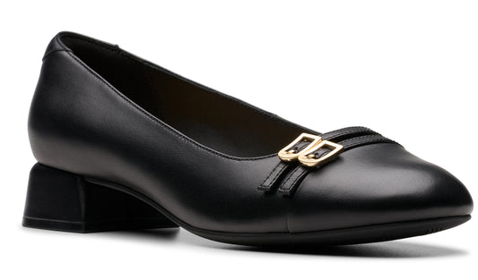Black dress shoe with a low block heel and gold buckle detail.
