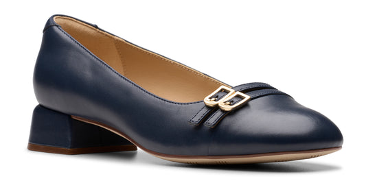 Navy blue leather pump shoe with a short block heel and double gold buckle detail.