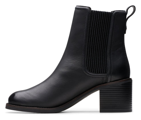 Black leather ankle boot with elastic side panels and block heel.