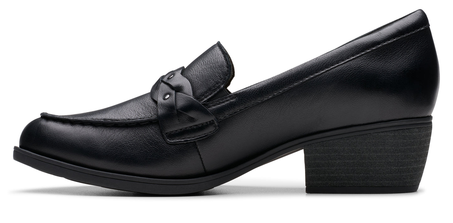 Black leather heeled loafer with a decorative knotted strap.