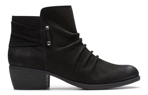 Black ankle boot with a low block heel and decorative straps.