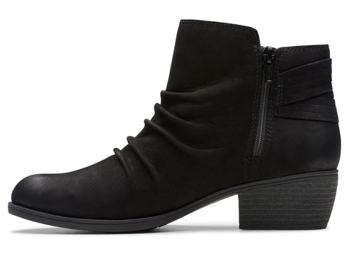 Black ankle boot with side zipper and stacked heel.