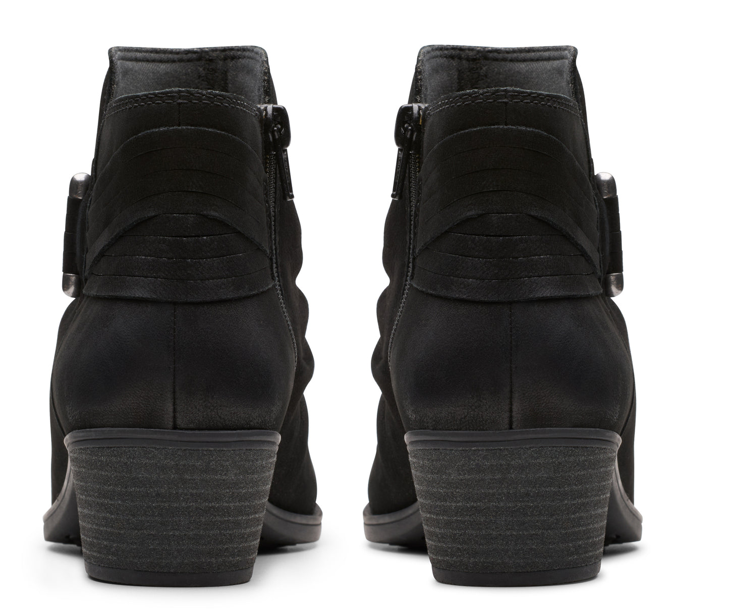 Pair of black ankle boots with block heels and side zipper closures.