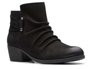 Black leather ankle boot with low block heel and decorative buckle strap