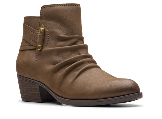 Ankle-high brown leather boot with a low block heel and ruched detailing on the vamp.