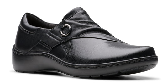 A black leather slip-on shoe with a rounded toe and a low heel.