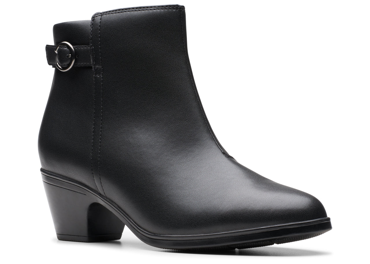A black, leather, ankle-high boot with a small heel and a decorative buckle.
