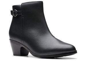 A black, leather, ankle-high boot with a small heel and a decorative buckle.