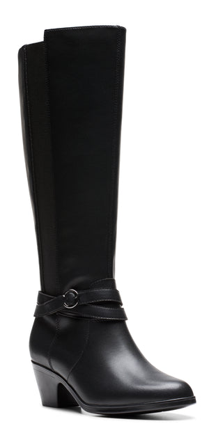 A black knee-high heeled boot with a strap and buckle detail.