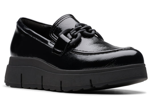 Black patent leather loafer with a thick black lug sole and a chunky chain detail on the vamp.
